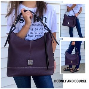 NEVER USED Plum Dooney & Bourke leather handbag.